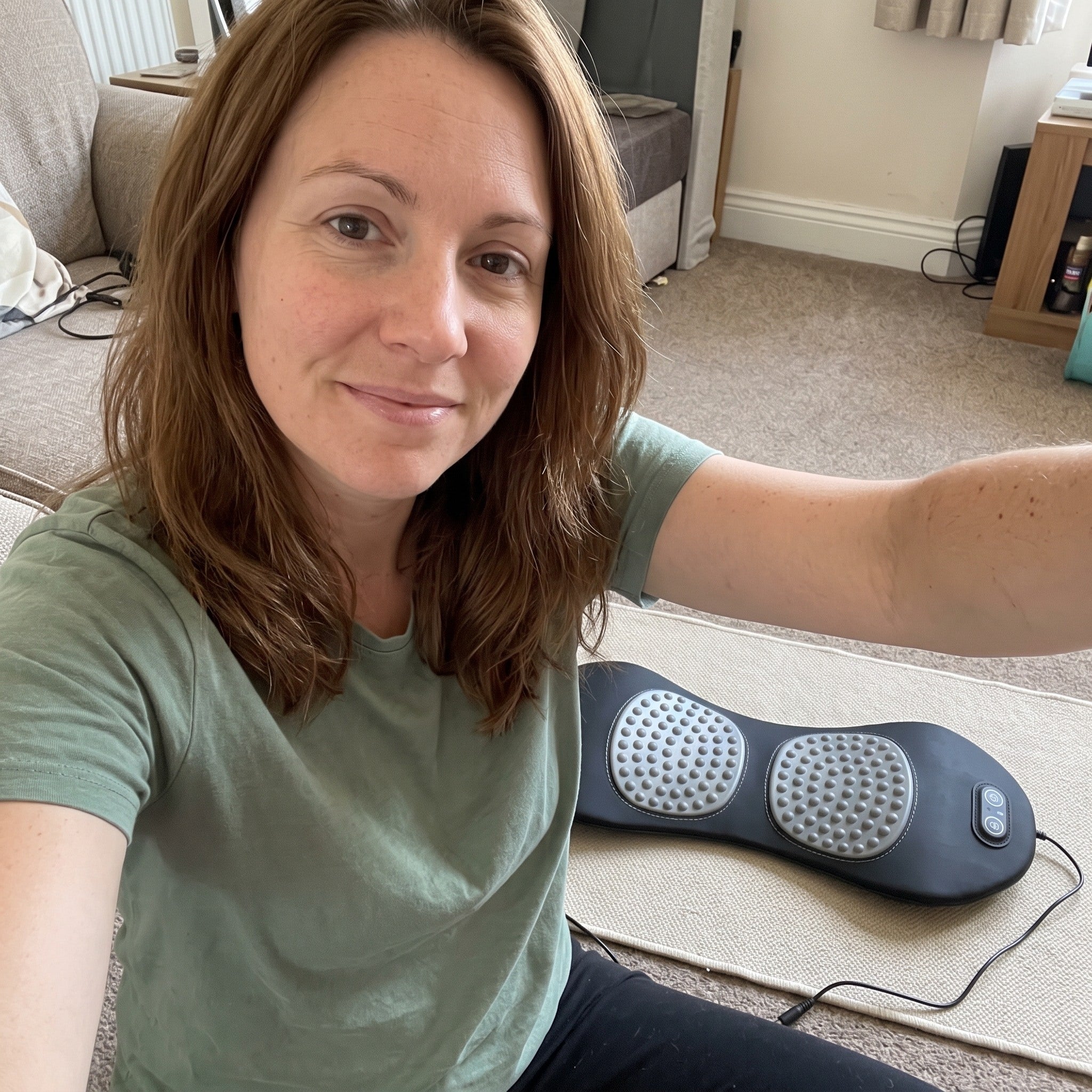 Emma with Easeback at home after a desk day